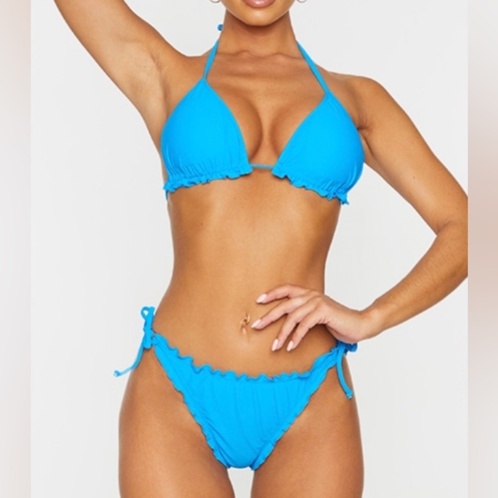 Blue frilly bikini top and bottoms TOP size 10 BOTTOMS size 2